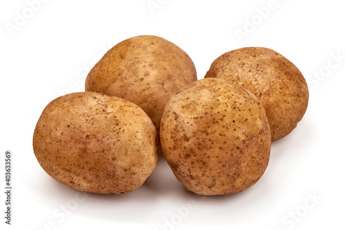 Unwashed potatoes  isolated on white background