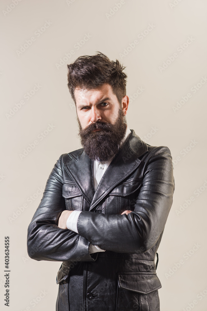 Fototapeta premium Fashion man. Man style. Handsome bearded male model portrait wear black cloth.
