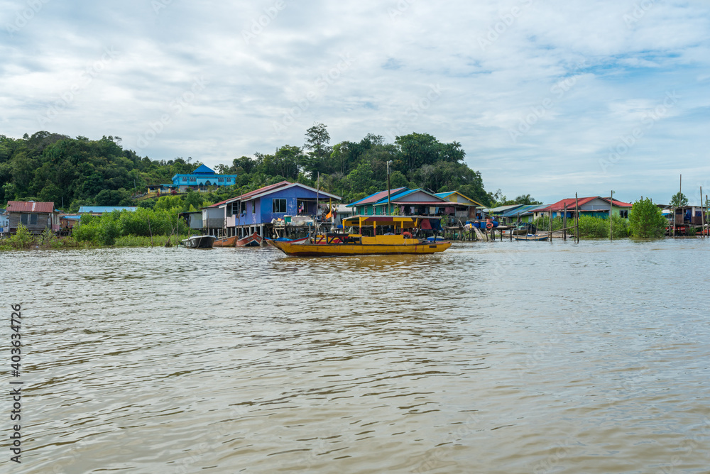 The village Bako Bazaar as starting point for excursions by boat to the Bako National Park. The Park, with has a rich biodiversity, is only accessible via the Tabo River and the open sea