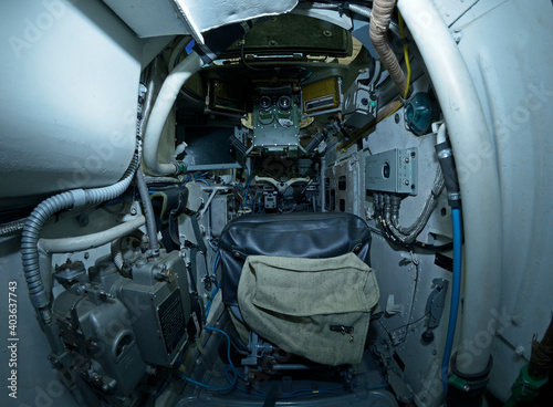 Armored vehicle gunner compartment – steering wheel and seat - of an Ukrainian armored personnel carrier BMP