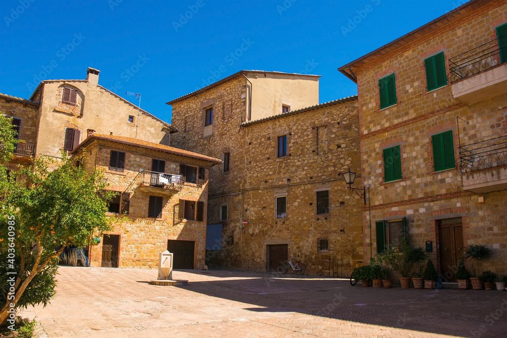 A residential square in the historic old town of the village of Pienza in Siena Province, Tuscany, Italy
