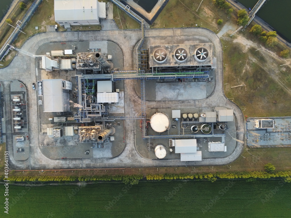 Aerial view of Oil and gas industry  facility for storage of oil and petrochemical products.Refinery oil and gas factory power and fuel energy.engineering concept.4k