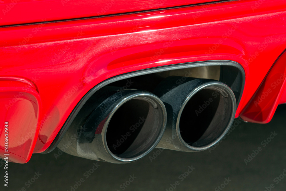 Close-up an exhaust pipe of a car.