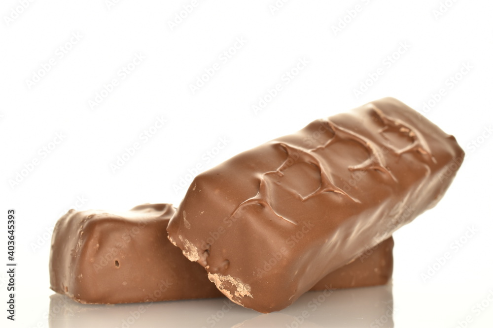 Two sweet chocolate bars, close-up, isolated on white. Two sweet chocolate bars, close-up, isolated on white.
