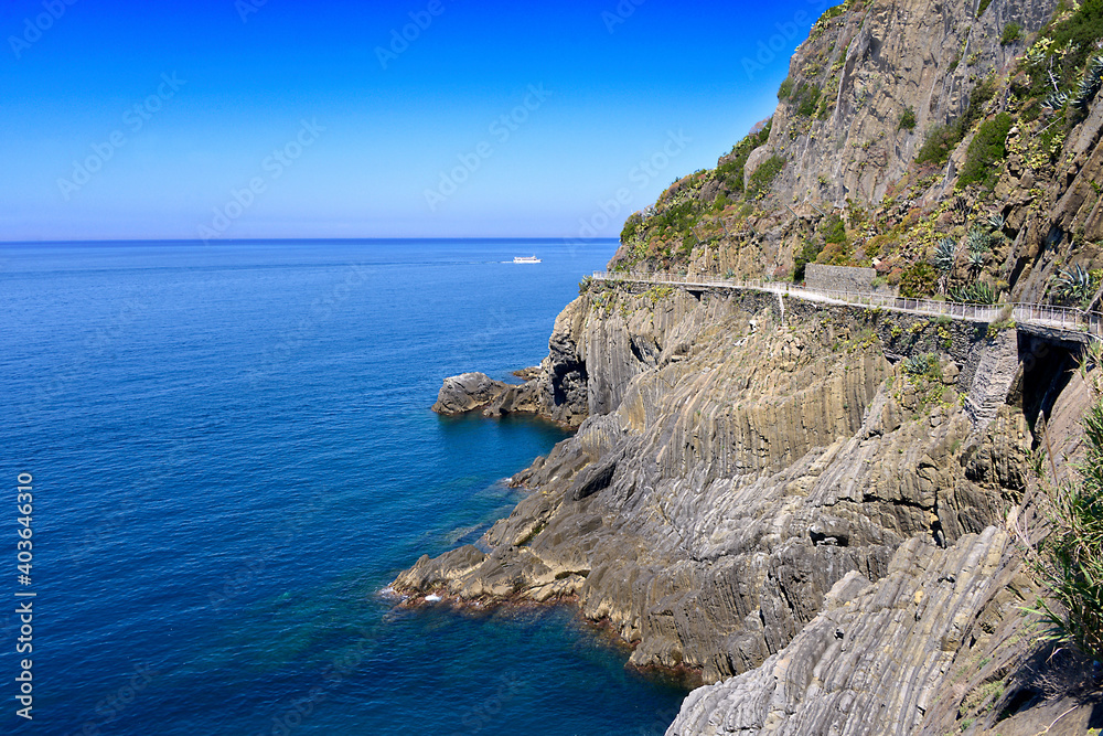Rocky coast of Riomaggiore, a commune in the province of La Spezia, situated in a small valley in the Liguria region of Italy