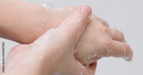 baby hands in foam, hand hygiene