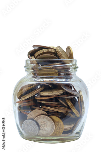 Transparent glass jar with coins isolated on a white background