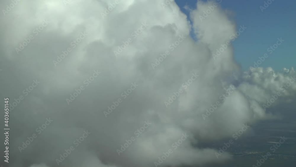 Flying into the clouds. Actual airplane high altitude footage. Cockpit view. Flying into the clouds. Actual airplane high altitude footage. Cockpit view.