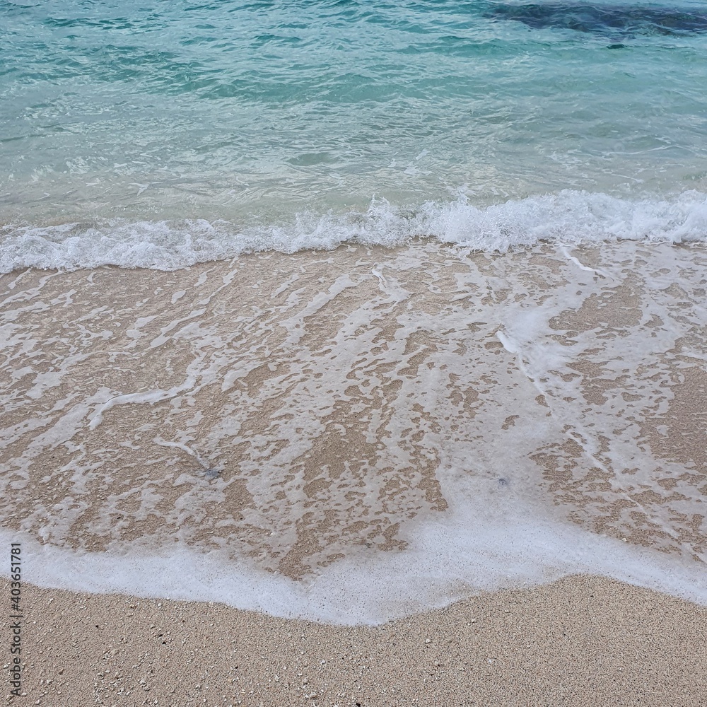 The emerald white sand beach of Jeju The emerald white sand beach of Jeju
