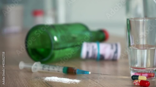 dirty table after drinking with money alcohol and drugs photo