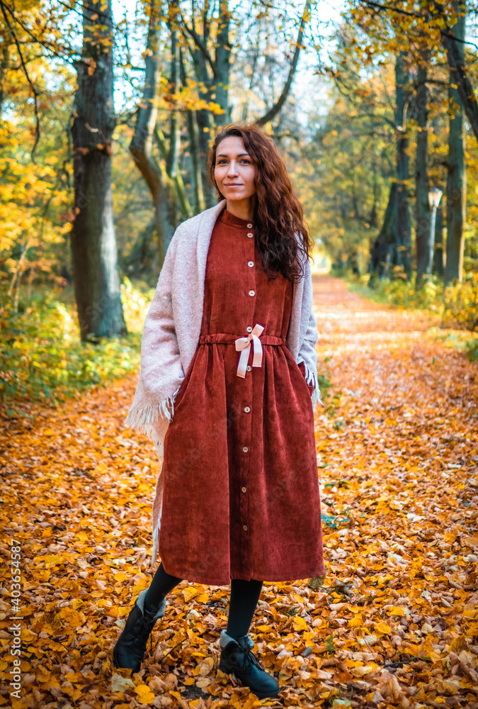 woman in the autumn park woman in the autumn park