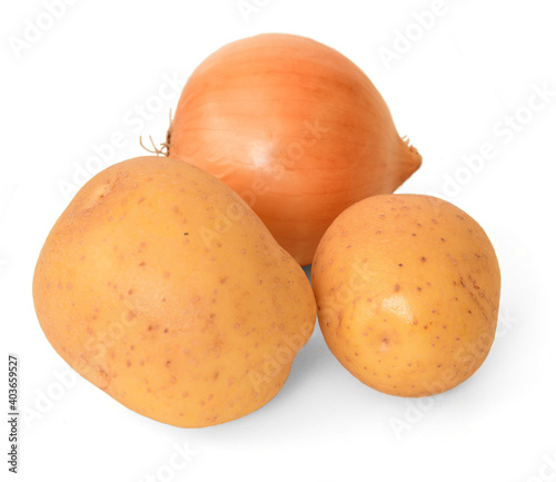 Raw potatoes and onion close up on white background