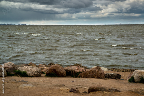 water of the Gulf of Finland in cloudy weather © olgavolodina