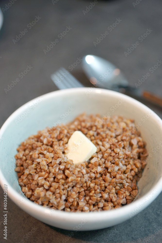 Buckwheat with butter in a small bowl Buckwheat with butter in a small bowl