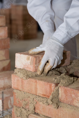 Craftsman Walls Brick Wall - Closeup Bricklayer photo