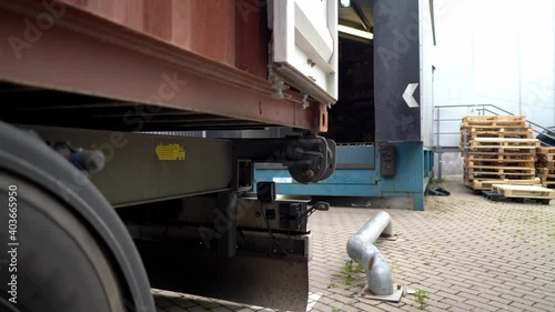 Big truck docking to loading ramp