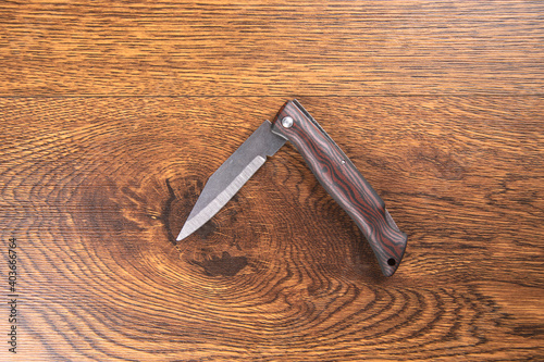 Tableau sur toile pocket knife on the wood