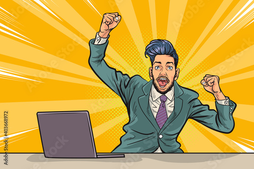 happy business man surprised with laptop