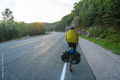 Cyclist on road, Ontario, Canada