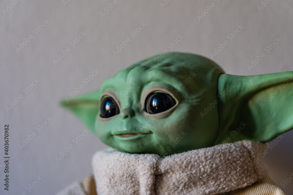 Naklejka premium DECEMBER 2020: The Child, Grogu or baby Yoda, fictional character from the TV series The Mandalorian.