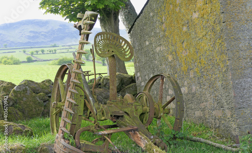 Horse Drawn Reaper used for cutting grass and other crops photo