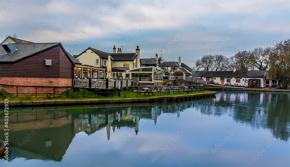 The lower canal basin settlement at Foxton Locks, UK on a still winter's afternoon