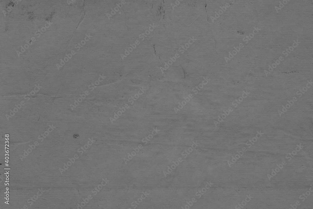 Fototapeta premium Cardboard black abstract texture close-up. Dark old paper background. Grunge concrete wall. Vintage blank wallpaper.