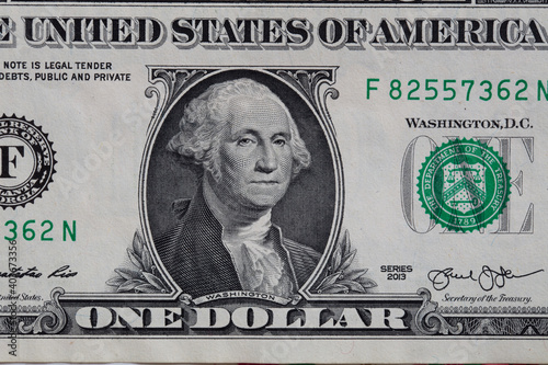 Closeup of front side of 1 dollar bill