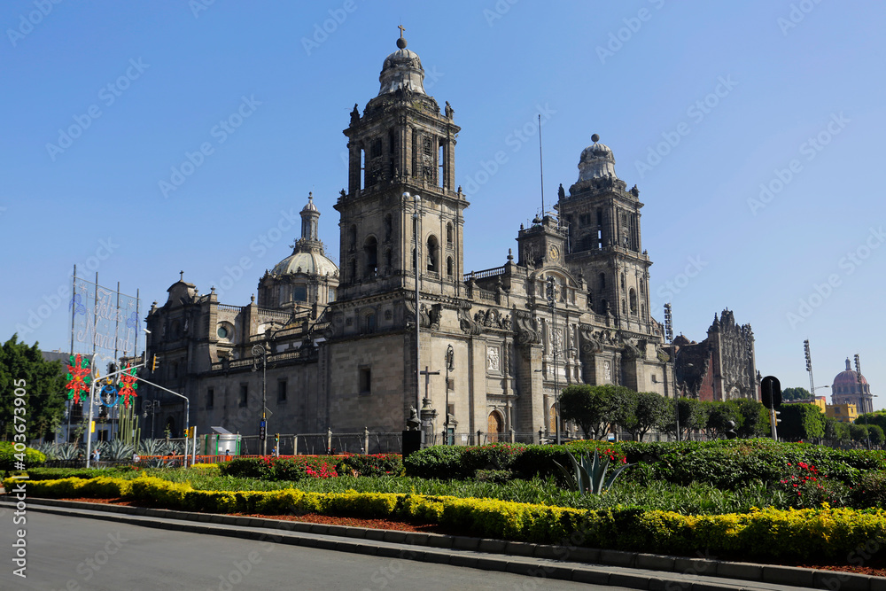 The Metropolitan Cathedral is seen during a blue sky sunny day in downtown Mexico City, DF, Mexico.