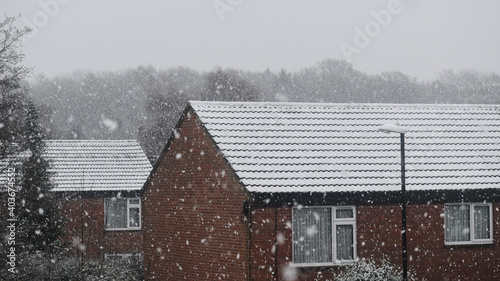 Old brick houses in snow on a winter morning, Coventry, UK