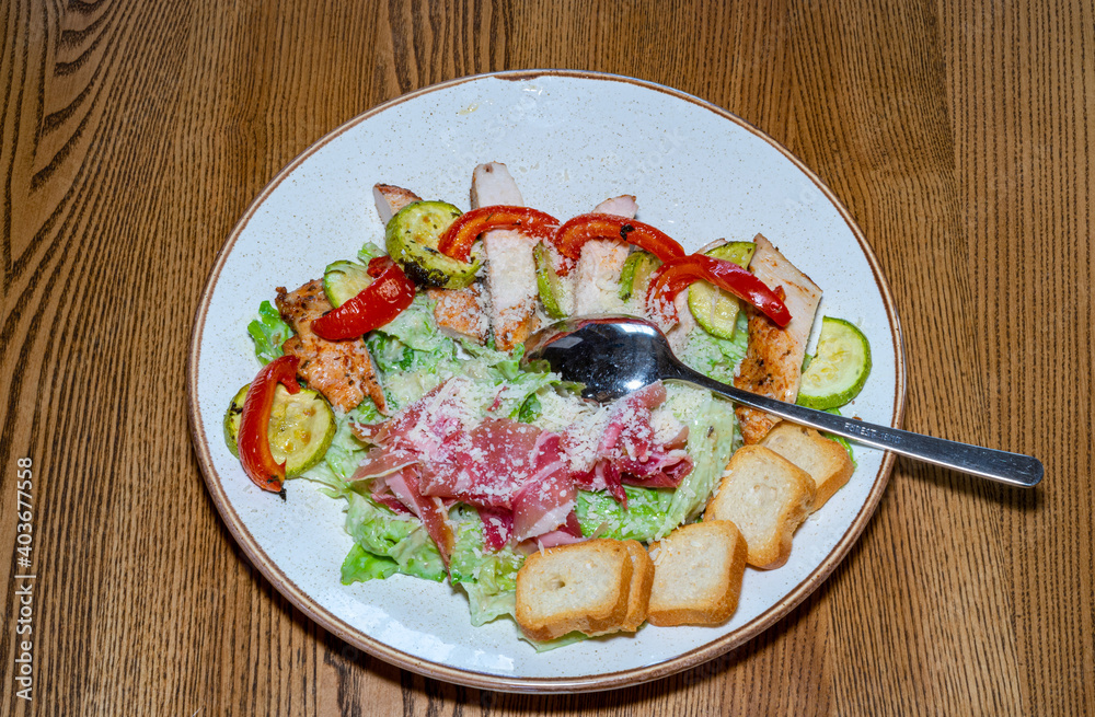 Delicious and healthy salad with meat and fresh vegetables Delicious and healthy salad with meat and fresh vegetables