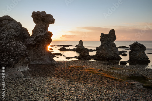 Picturesque limestone cliffs, so-called Raukar, on the east coast of the Swedish island of Gotland near Folhammar, north of Ljugarn photo