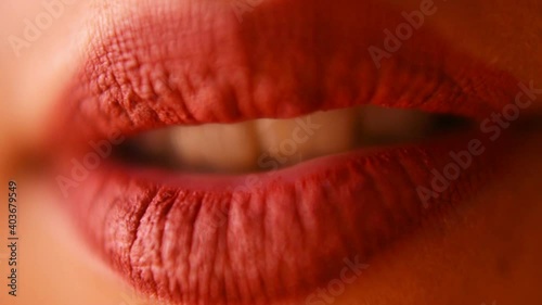 Macro. Close-up of open female lips