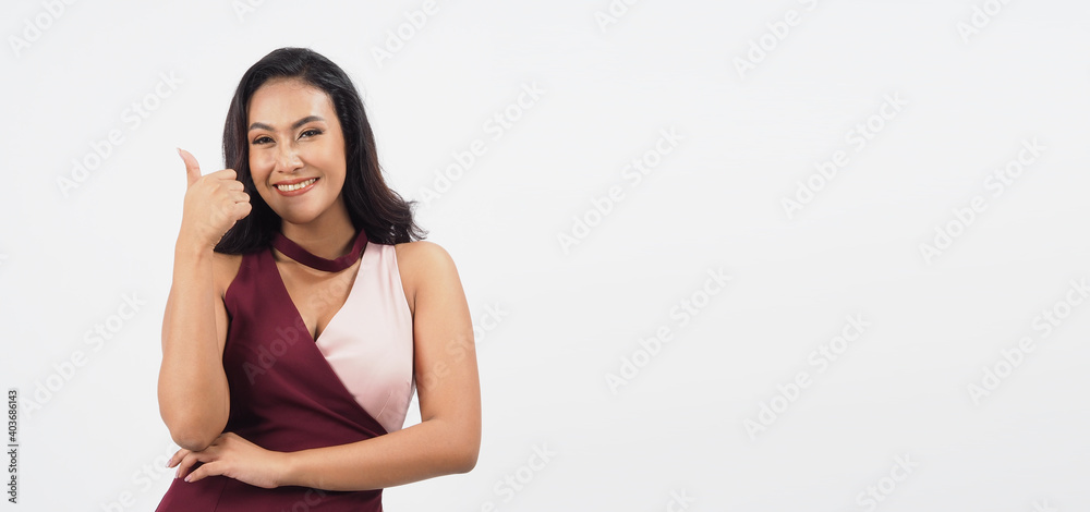 Asian sexy and beautiful woman doing thumb up or like sign on white background.She have tan skin Asian sexy and beautiful woman doing thumb up or like sign on white background.She have tan skin