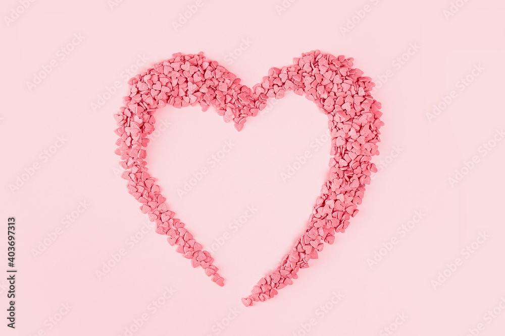 Heart shape candy pink hearts background of cake sprinkles in flat lay with copy space, feminine blogger or festive love gift and Valentine's Day concept. banner mockup. Small hearts minimal
