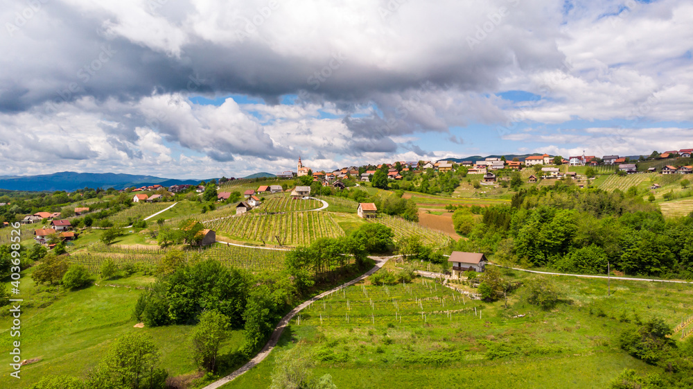 Picturesque aerial panorama of spring countryside on a sunny day.