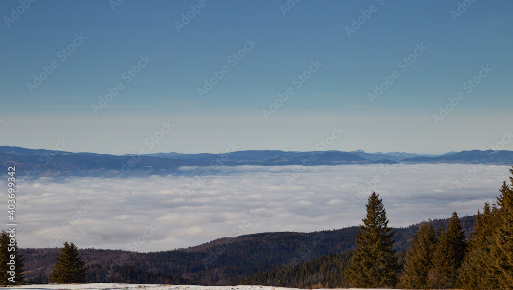 Mountain top and above clouds