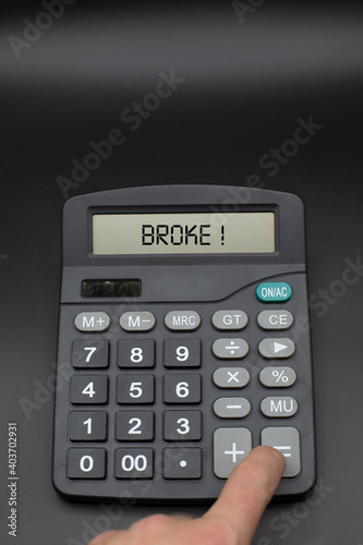 Photography Person calculates his money and finds out that he is broke and penniless due to