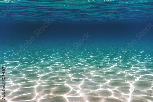 Sandy sea bottom Underwater background photo
