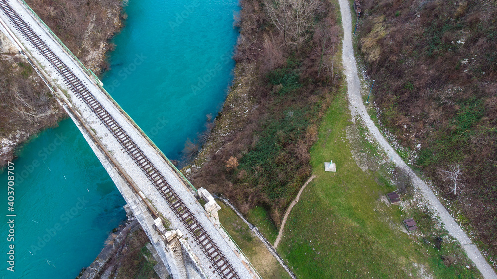 Aerial view of a stone railway bridge over the Soča River near Solkan by Nova Gorica, Slovenia