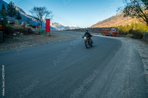 Person on bike in Kullu valley , Himachal Pradesh