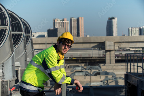 worker on cooling tower plant