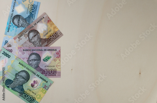 Overhead shot of Angolan Kwanzas banknotes new serie launched at the end of 2020 photo