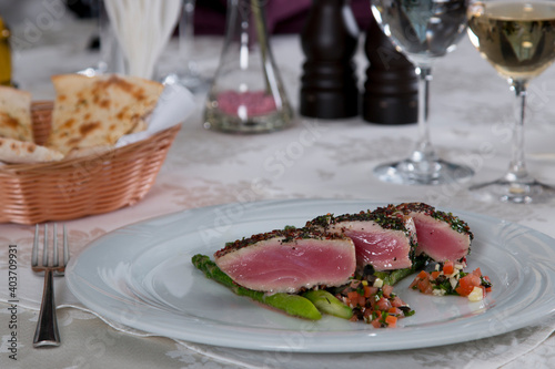 Delicious tuna steak with mixed vegetables and asparagus