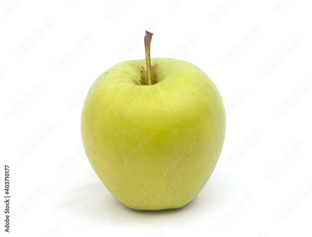 Green apple on white background with minimal shadow