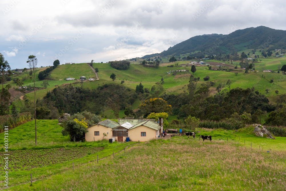 Country houses in a country landscape of potato production area. Boyacá. Colombia.