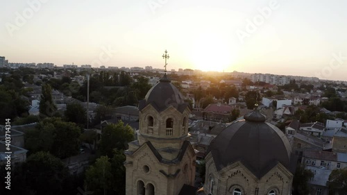 flying over the domes of the church around the golden crosses of the Orthodox Church.