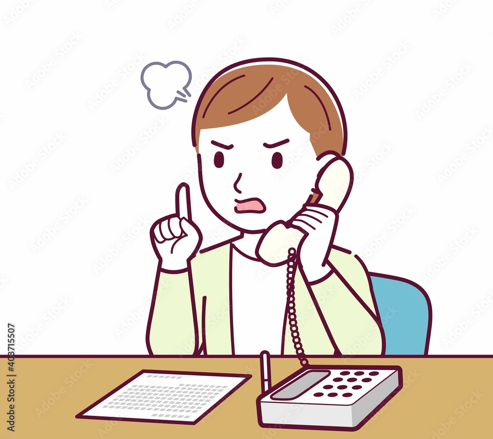 Young woman in a cardigan_Fixed-line phone Young woman in a cardigan_Fixed-line phone