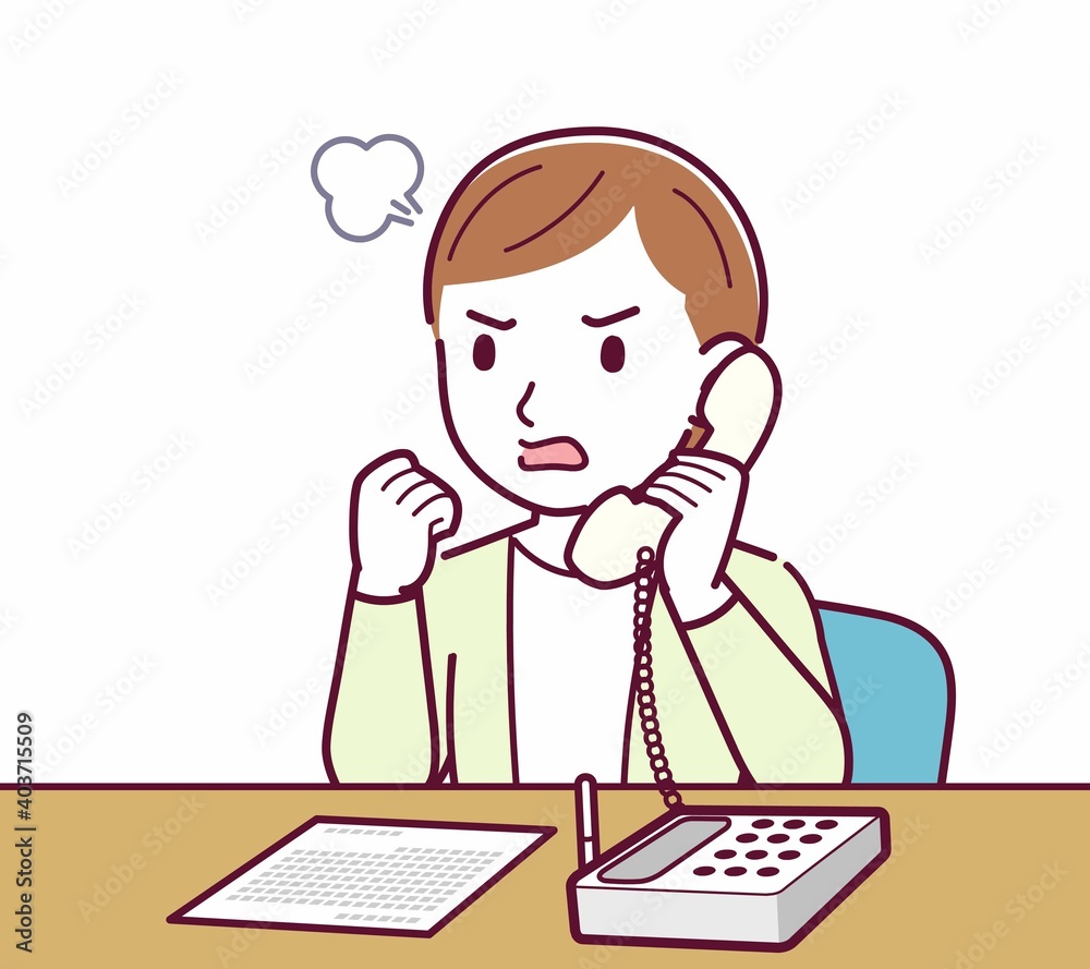 Young woman in a cardigan_Fixed-line phone Young woman in a cardigan_Fixed-line phone