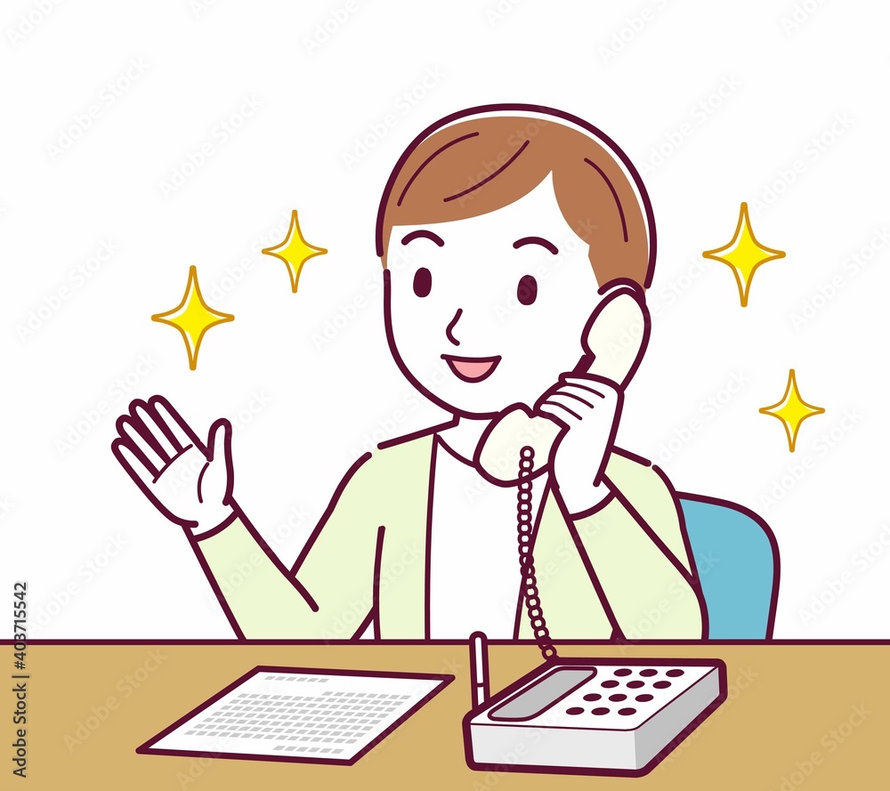 Young woman in a cardigan_Fixed-line phone Young woman in a cardigan_Fixed-line phone